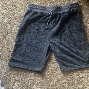 Broken Threads blue shorts.